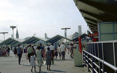 Exiting the subway station and onto the platform heading to the Main Gate of the Entrance Building