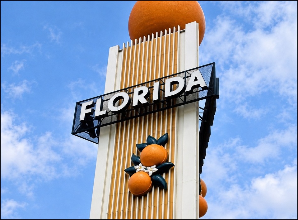 Florida Pavilion — giant orange tower and porpoise show