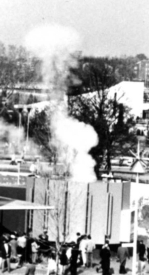The smoke machine blows "puffs of smoke" outside the General Cigar Pavilion