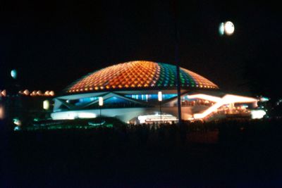 Swirling lights atop the General Electric Pavilion