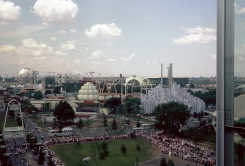 Oh those lines! Lines! Lines! (Top) Crowds wait in open-air lines to enter the GE exhibit. Waits of 2 hours or more were