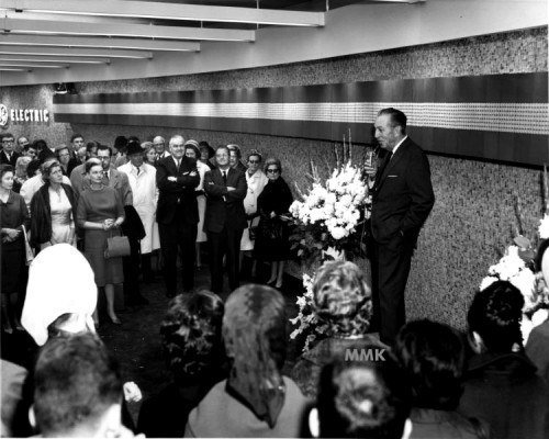 (Top) Wald Disney inspects a model of the GE Pavilion in 1963 along with Gerald L. Phillippe, President, General Electri