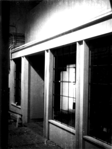 (Top) Factory "front" under construction in Medallion City. (Bottom) Workmen prepare the Steel Mill diorama for Medallio