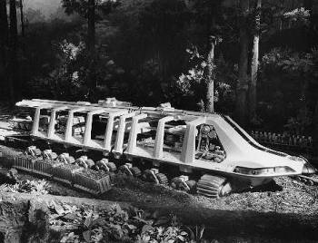 Then a Giant Machine, a Factory on Wheels, Cuts Up the Stumps and Jungle Growth...