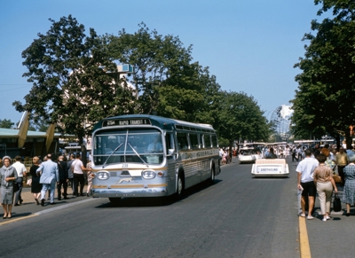 A Bus and Escorter operated by Greyhound at the Fair