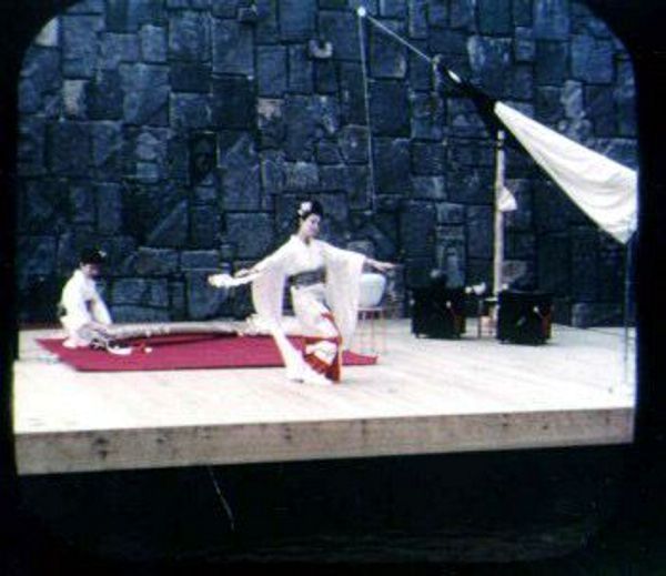 Geisha dance in front of Stone Crazy wall