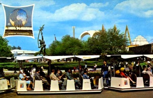 Official postcard of Glide-a-Ride trains with Rocket Thrower