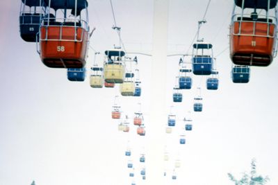 Gondolas of Swiss Sky Ride float across Fair at 115-feet