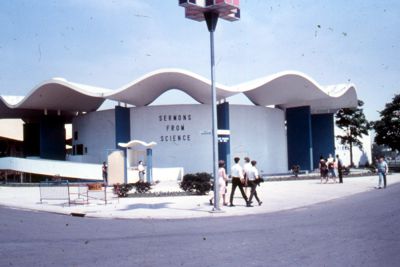 Sermons from Science Pavilion - scalloped roof is reached by ramp over reflecting pool