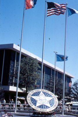 Oklahoma's exhibits are shown in park with winding pathways, spacious lawns and pools