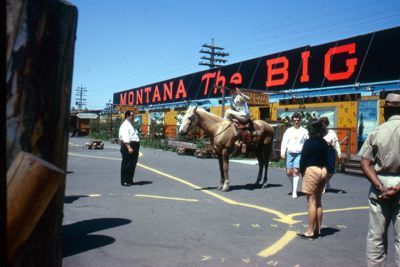 Seven gaily painted railroad cars contain Western exhibit from Montana, the "Big Sky Country"