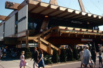 Austria's Pavilion fashioned from laminated Alpine spruce, suspended above ground from three soaring A-shaped supports