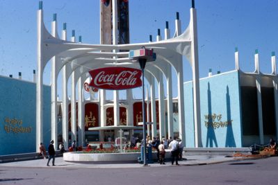 Eliptical two-story Coca-Cola Pavilion with world's largest electric carillon in 120-foot tower