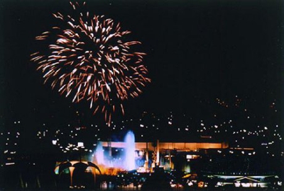 Fireworks explode over the Fountain of the Planets