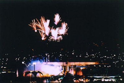 Fireworks explode over the Fountain of the Planets