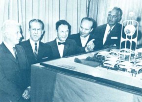 Discussing the model of The Seven-Up Exhibit