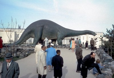 Brontosaurus of Sinclair Dinoland peers down on motorists along the Grand Central Parkway
