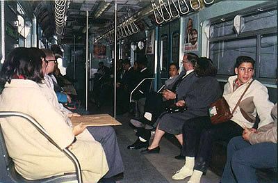 Interior of new, blue subway car, enroute to Fair