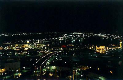 Night time panorama of amusement area and lake from Tower