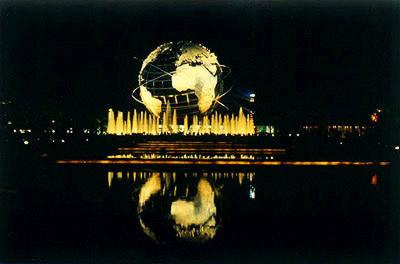 Lighted Unisphere across reflecting pool