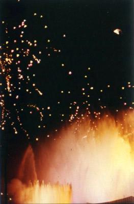 Yellow fountains and bursting fireworks