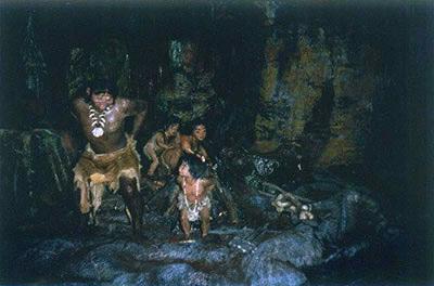 Caveman and family warm their bottoms on Ford Magic Skyway